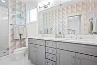 walk in shower and double vanity sinks