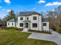 This exceptionally crafted new construction home was built by local Linville Builders and exquisitely designed by Ashley Rohe Interiors.