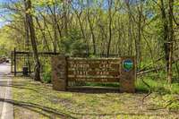 A stone's throw from Radnor Lake State Park, you'll find an array of natural treasures in your backyard. Perfect for nature enthusiasts, the park offers ranger-led programs including canoe floats, wildflower walks, astronomy night hikes, and more.