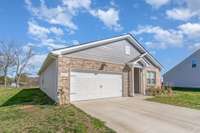 2 car garage and concrete driveway