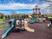 Enjoy fenced in playground next to pool---great community amenities in Wright Farms!