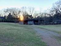 3 stall horse barn with concrete slab and dirt floor