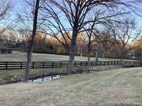 Water has gone past the fence,, you can move the fence to the exterior of this creek closer to Kirkman