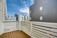 The living room deck is an ideal spot for enjoying morning coffee