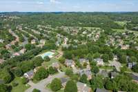 An aerial view of the wide streets and lush trees that set Traceside apart as an especially livable and enjoyable neighborhood to call home.