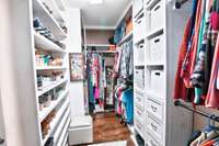 Dreamy, spacious owners closet with built-ins!