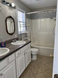 ensuite bathroom to the primary bedroom