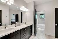 Jack'n Jill bathroom with double vanities.