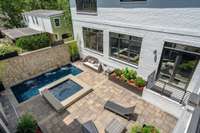 Courtyard with heated pool, hot tub and entertaining space.
