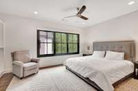 Bedroom 2 with builtins and view of the courtyard.