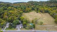 Build your dream home on this 9 acre lot. All utilities available at road. No HOA, tons of privacy, stunning hillside views, and centrally located for easy access to everything.