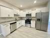 Kitchen with granite countertops and stainless appliances