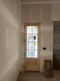 Friend's entrance accessible to mudroom and garage  *this home is under construction Photo taken 7/20/24