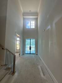 Grand Two-story foyer *this home is under co0nstruction photo taken 9/18/24