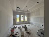 Bedroom 3 ensuite with tray ceiling  *this home is under construction photo taken 7/20/24