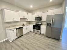 Kitchen with granite countertops and stainless appliances