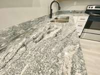 Granite countertops with stainless steel appliances