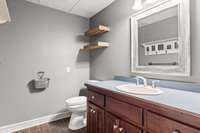 Half bath featuring ceramic tile flooring.