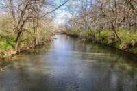 Let your imagination run wild as you explore the banks of this amazing creek!  Be sure to check out the land video on the MLS.