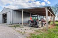 Expansive interior and sturdy concrete floor, the barn offers storage for farm machinery, livestock feed, and all your recreational gear.