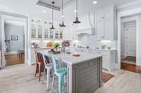 Wow!  Breathtaking kitchen with quartz countertops and incredible cabinetry!