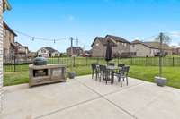 Expansive patio offers an inviting space for entertaining. (Green egg does not remain)