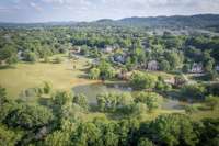 When McGavock Farms was developed, space was left as a common park area for use by residents.  You frequently see people and their pets, and young children playing in this space.  It also serves well for gatherings for neighborhood residents.