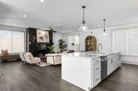 The dining room flows right into the gourmet kitchen and large family room, which are truly the heart of this home.