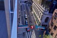 View of the iconic Printer’s Alley sign from the balcony, overlooking Church Street.