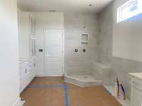 Actual Home Owner's Bath's Tiled Walk-In Shower With Rainhead & Bench and Standalone Tub to Come (As of 4.16.24)