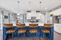 Kitchen island can be used as a dinning area with space for four.