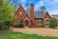 The exterior of this home boasts a stunning brick façade complemented by meticulously manicured landscaping, creating an enchanting curb appeal that captures the eye and sets the stage for the beauty within.