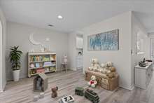 The entry room could be a great space for a playroom or homeschool room as well.