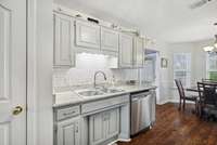 Tile backsplash and granite countertops!