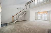 Open living room with vaulted ceilings