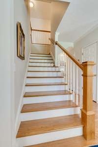 Front staircase leading upstairs - however the house also has a back staircase leading upstairs