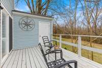 5x5 storage shed and backdeck overlooking the acres of green space