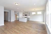 Standing in great room looking at kitchen and casual dining *Photo not of actual home