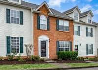 Well-maintained center townhome.
