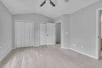 Large closets in this room with updated ceiling fan.