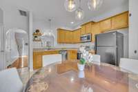 Updated lighting in kitchen and throughout provides ample light in this nice sized kitchen with pantry.