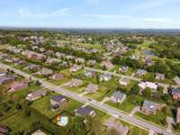 It won't take long to find this PERFECT  home for  you! Look at the COLOR around the 5 ft inground saltwater pool! AMAZINGLY Beautiful!  Oaks Pointe Subdivision is adjacent to the Five Oaks Golf Course.