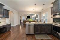 Kitchen area includes built-in desk to allow for work and online searches for your favorite recipes.