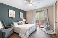 Guest bedroom upstairs with separate entrance to  upper balcony overlooking the pool.