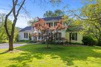 Lush landscaping provides the perfect setting for this home - the lot is truly spectacular!