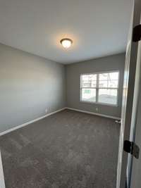 this is the 2nd bedroom (upfront) on the first floor