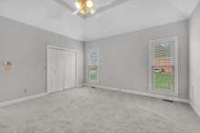 Another view of the primary bedroom with extra large closet.