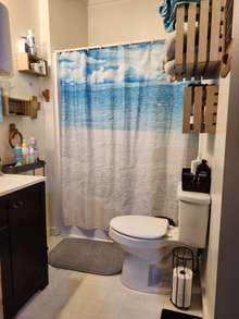 Bath in Den area with shower