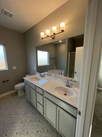 primary bathroom with double sinks