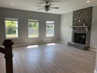 Great room  *COLORS AND SELECTIONS VARY, HOME PICTURED IS AN EXAMPLE OF THE FLOORPLAN NOT THE ACTUAL HOME*